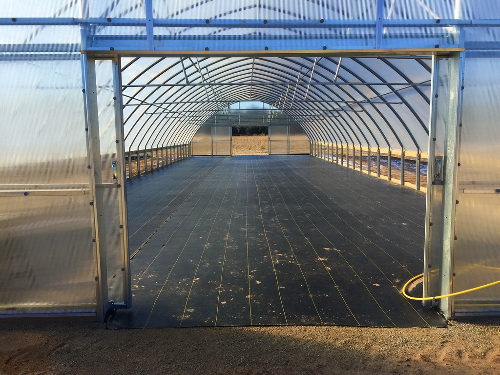 One of the new Thermolator 30 greenhouses, just built and ready for planting.