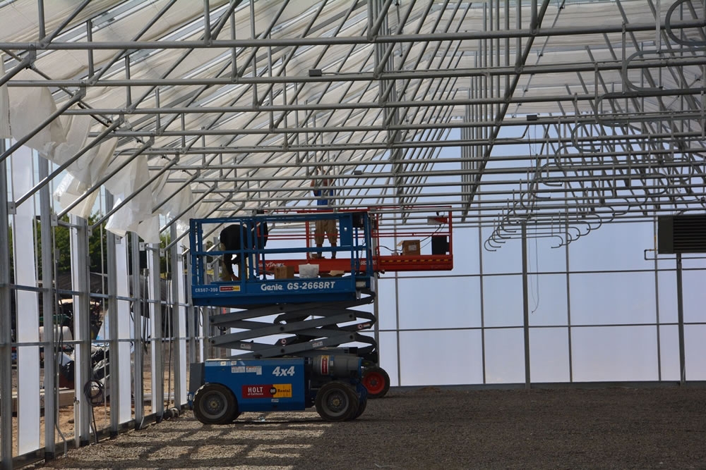Ag Con Construction crew at work on the Shade Curtain | Agra Tech